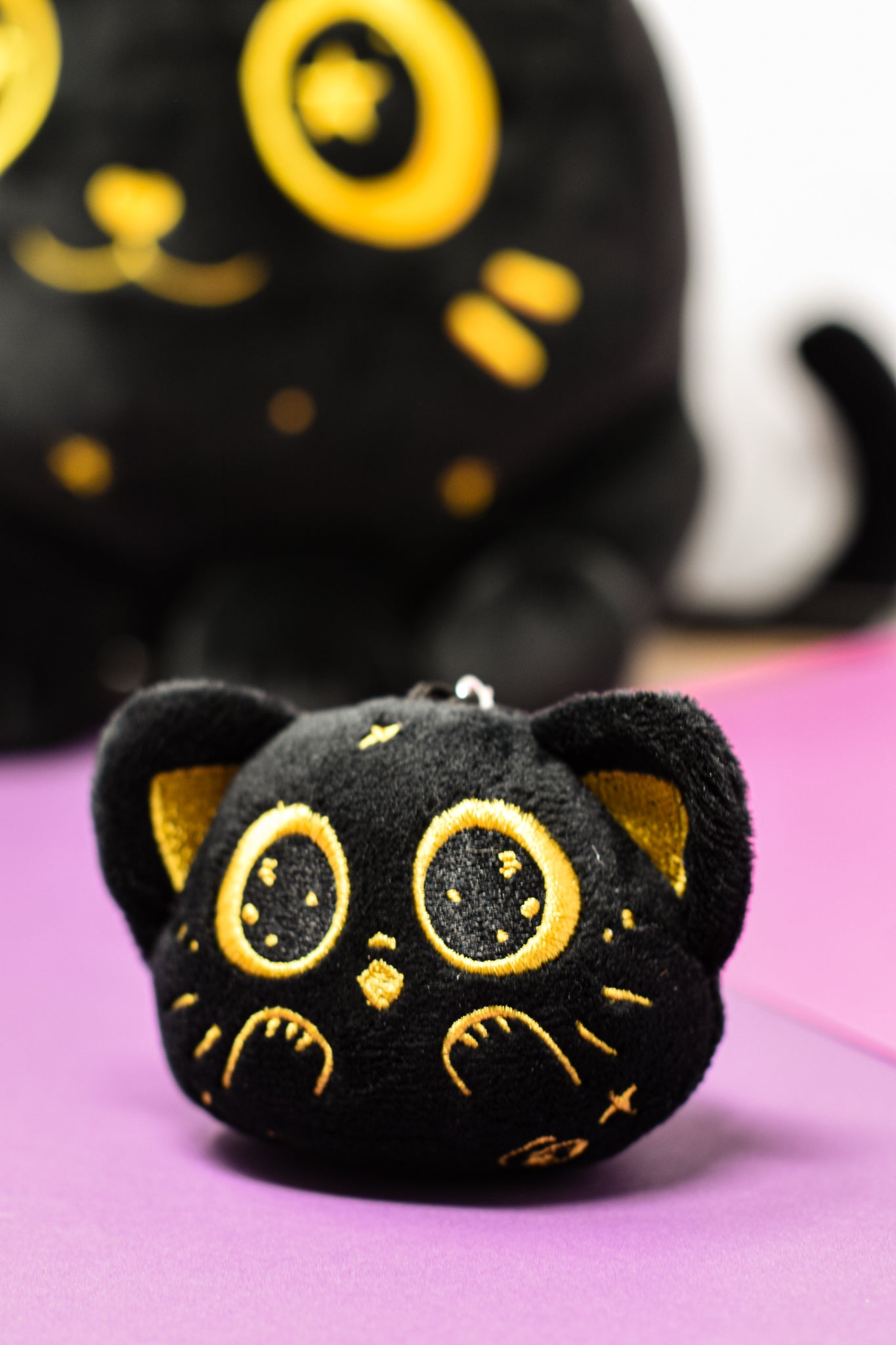 astral kitty plush key chain