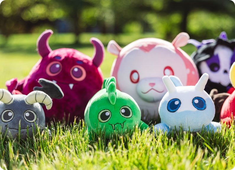 plushies on grass